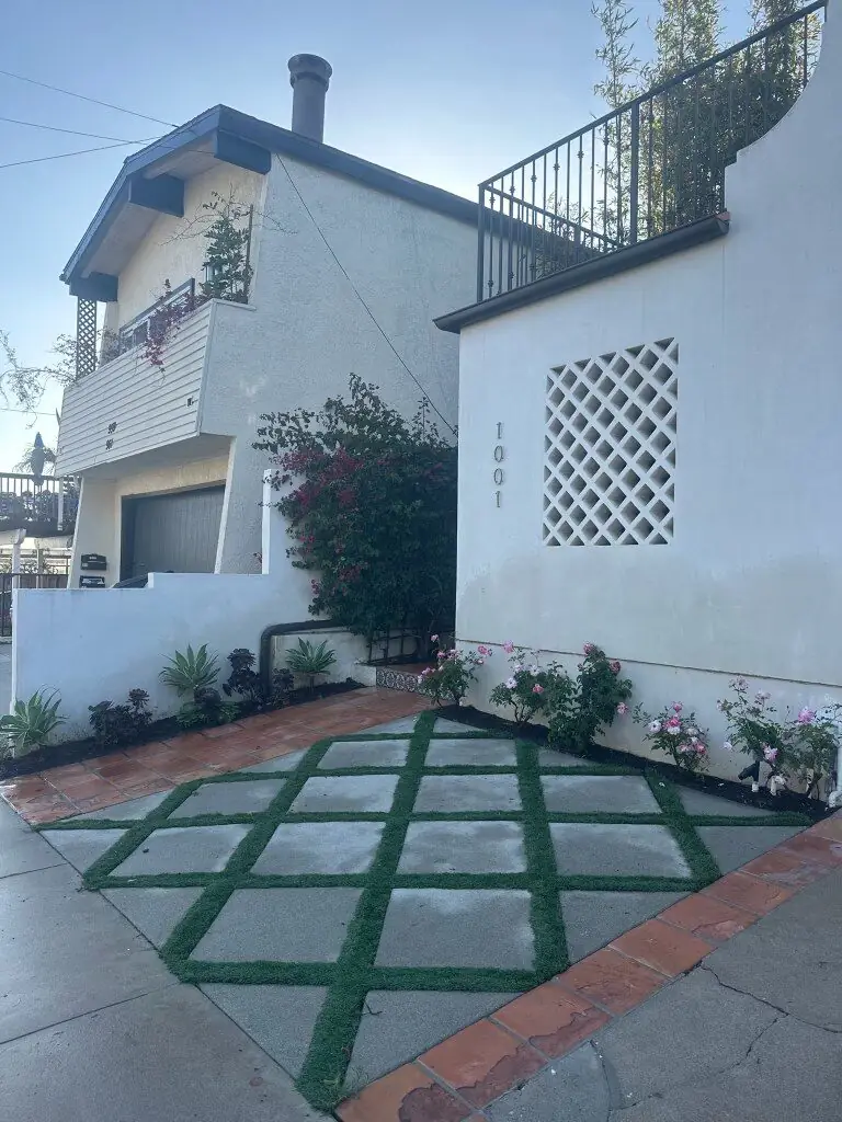 Finished diamond-pattern paver entry with turf joints installed by Operational Gardener in the South Bay, California